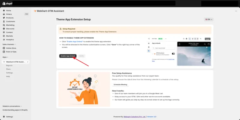 The app embed setup page in GTM Assistant, with an arrow pointing to the Enable App Embed button.