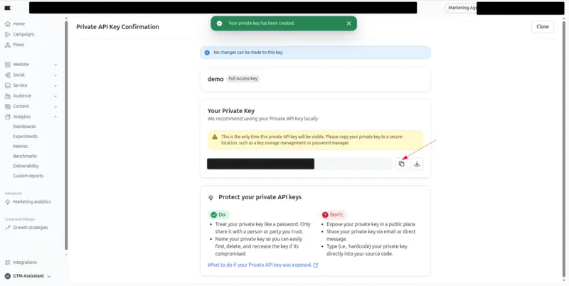 Klaviyo's Private API Key Confirmation page, with an arrow pointing to the button that copies the new key.